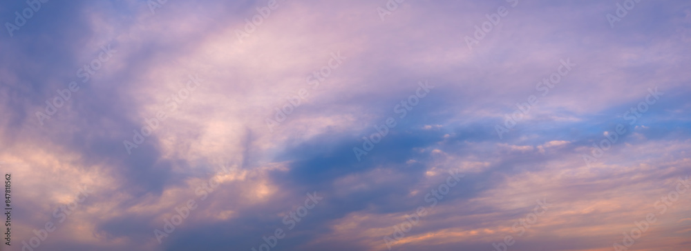 Fototapeta premium Beautiful sky sunset with red clouds on blue background