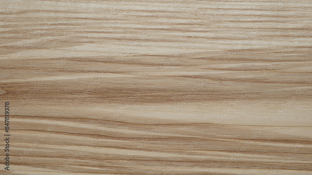 A wooden surface with a grainy texture background. The wood appears to be aged and has a natural, rustic feel to it. The grain of the wood is visible in the image A wooden surface with a grainy texture background. The wood appears to be aged and has a natural, rustic feel to it. The grain of the wood is visible in the image