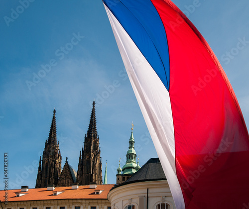 Canvas Print The flag of the Czech Republic against the the sky , a view through the tiled ro