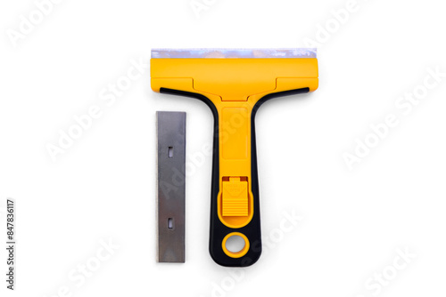 Construction plastic scraper with interchangeable blades isolated on white background.