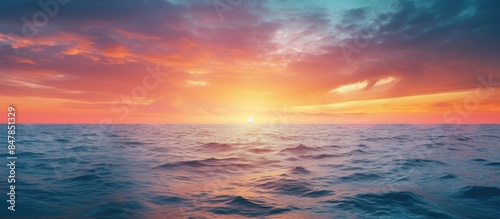 Sunset in the middle of the sea. Creative banner. Copyspace image