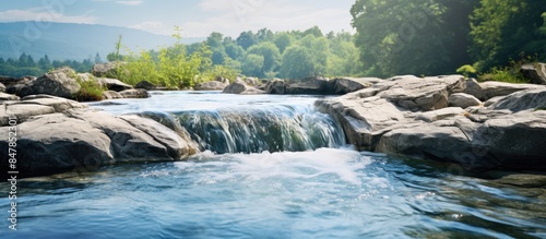 An attractive image of flowing water over stone Water flowing along with big stone Brize A beautiful stone with water landscape. Creative banner. Copyspace image photo