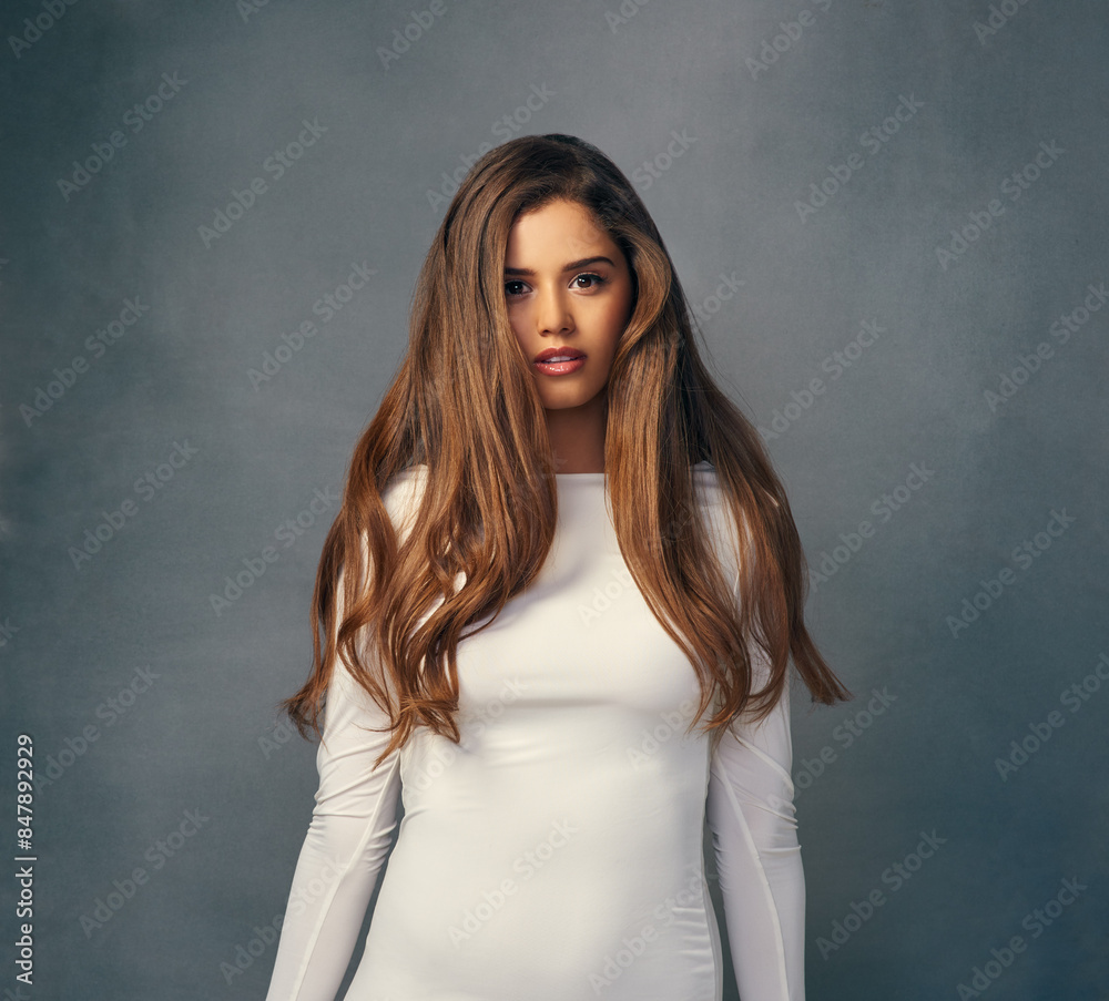 Cosmetics, portrait and woman confident for haircare, treatment or fashion in studio background. Female person, beauty and salon treatment for wellness, healthy growth and keratin or collagen Cosmetics, portrait and woman confident for haircare, treatment or fashion in studio background. Female person, beauty and salon treatment for wellness, healthy growth and keratin or collagen