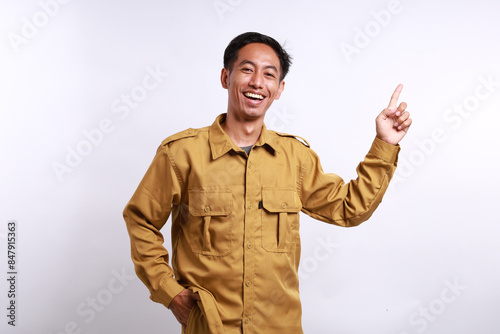 Happy Indonesian government employees standing getting an idea. Isolated on white background