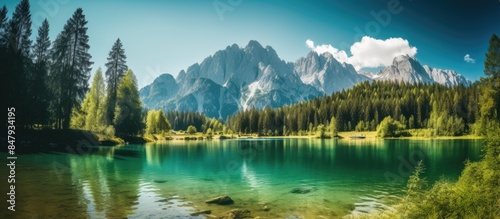 Fototapeta Naklejka Na Ścianę i Meble -  View of zugspitze with forrest and lake in foreground. Creative banner. Copyspace image