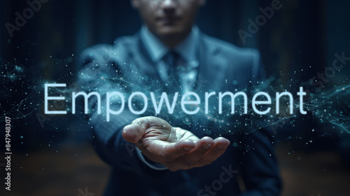 Empowerment word on the hand of a businessman. Text concept