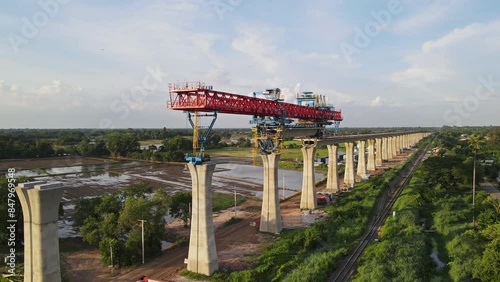 Wallpaper Mural Construction of a high-speed elevated railway using cranes for the Bangkok to Nakhon Ratchasima high-speed rail project. Torontodigital.ca