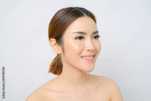 Close Up of Asian Woman Examining Her Yellow Teeth