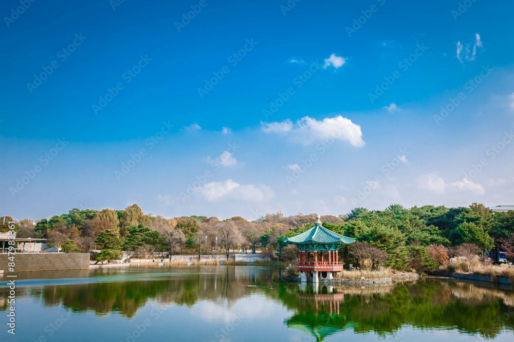 Sunset at the Hyangwonjeong Pavilion in the center of the pond in the Gyeongbokgung palace, Seoul, South Korea.