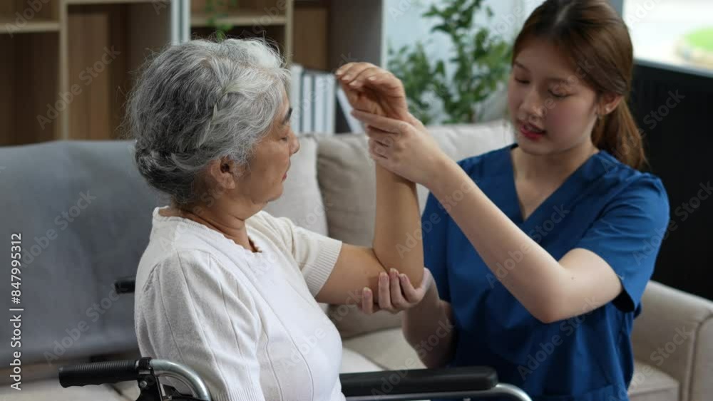 senior woman doing exercise at clinic with physiotherapist. help of a personal trainer during a rehabilitation session. senior woman doing exercise at clinic with physiotherapist. help of a personal trainer during a rehabilitation session.