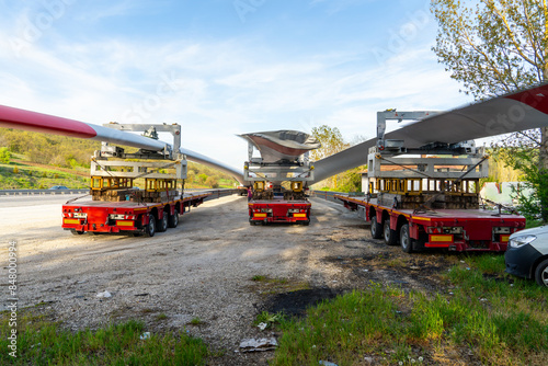 Long Wind Energy wing (blades) for electricity generation. Transport on road by special long Truck