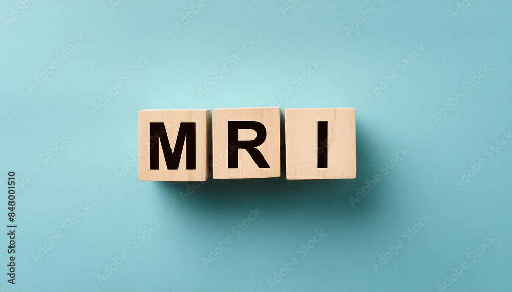 Wood blocks with abbreviation text MRI - Magnetic Resonance Imaging. Medicine concept. Top view Wood blocks with abbreviation text MRI - Magnetic Resonance Imaging. Medicine concept. Top view