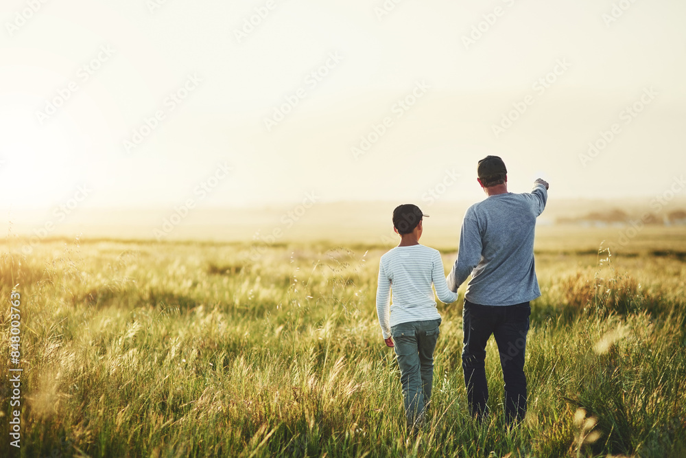 Back, field and father with boy, walking and adventure with sunshine, getaway trip and bonding together. Family, single parent and dad with son, travel and child with weekend break, nature or outdoor Back, field and father with boy, walking and adventure with sunshine, getaway trip and bonding together. Family, single parent and dad with son, travel and child with weekend break, nature or outdoor