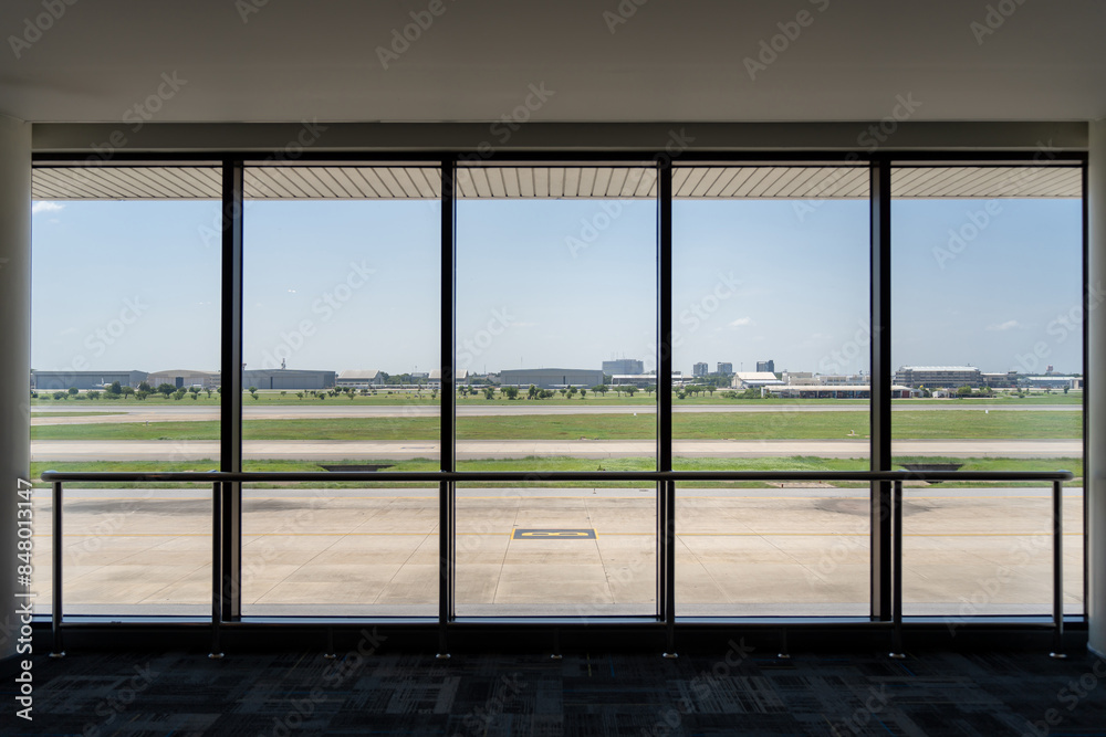 Naklejka premium View of airport runways from the terminal window