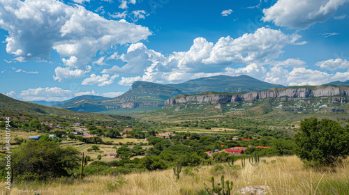 Scenic view of Presa Zarco with mountains and lush valley photo