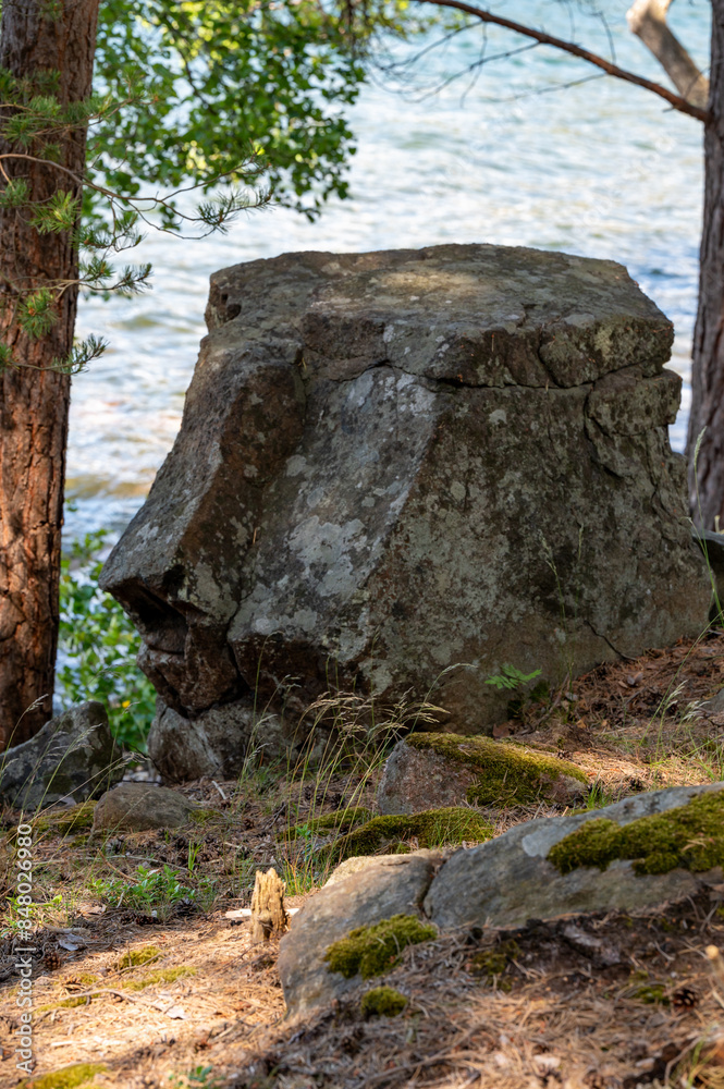 Fototapeta premium Rock near water looking like a stone from Easter island