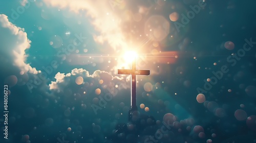 Christian  cross on sky in centr, with ligt from above bokeh ligth, epic, dramatic clouds,  photo