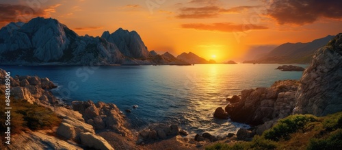 Fototapeta Naklejka Na Ścianę i Meble -  evening view of the beautiful mountain in the sea with rocks in the foreground. Creative banner. Copyspace image