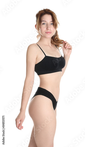 Woman with slim body posing on white background