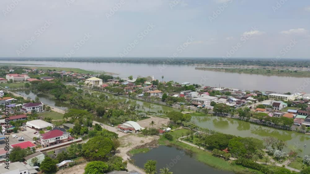 Aerial view of Mekong River with green mountain hill. Nature landscape background in Ubon Ratchathani, Thailand and Laos. Aerial view of Mekong River with green mountain hill. Nature landscape background in Ubon Ratchathani, Thailand and Laos.