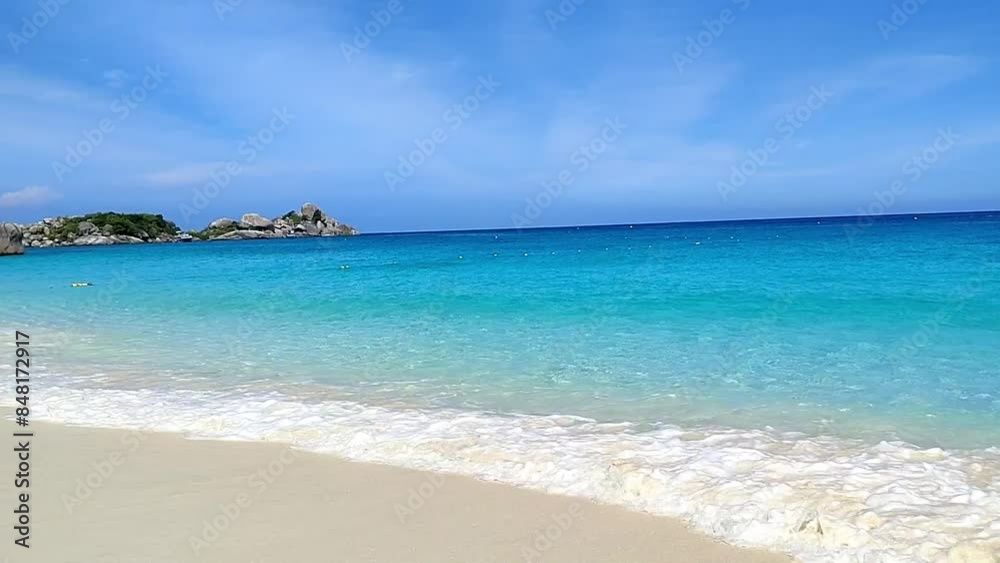 Blue sea, ocean somewhere in the tropics with yellow sand on the beach and small waves, for tourists, vacationers. Blue sea, ocean somewhere in the tropics with yellow sand on the beach and small waves, for tourists, vacationers.