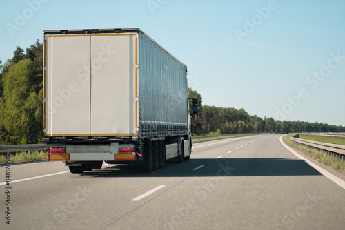 Intermodal Multimodal Distribution Delivery Freight Cargo Truck In Motion.. © Andriy Sharpilo
