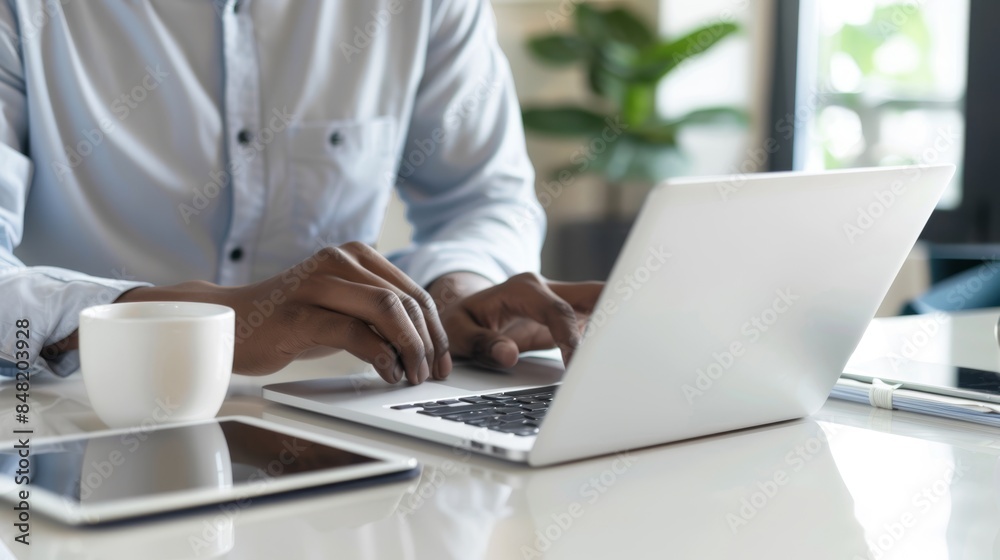 The hands typing on laptop. The hands typing on laptop.
