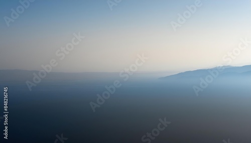 Peaceful Misty Morning Over Ocean