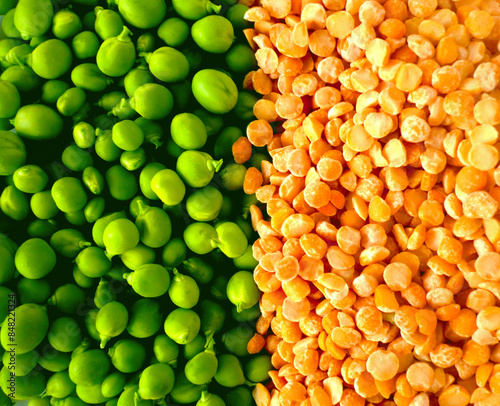 Orange & green peas legume background pattern texture. Green fresh peas & ogange gry peas top view background in market. Harvest of green orange peas vegetables from organic farm for sale background  photo