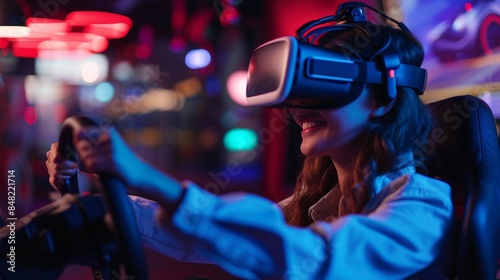 People play car racing video games with VR headset in virtual world. © rabbit75_fot