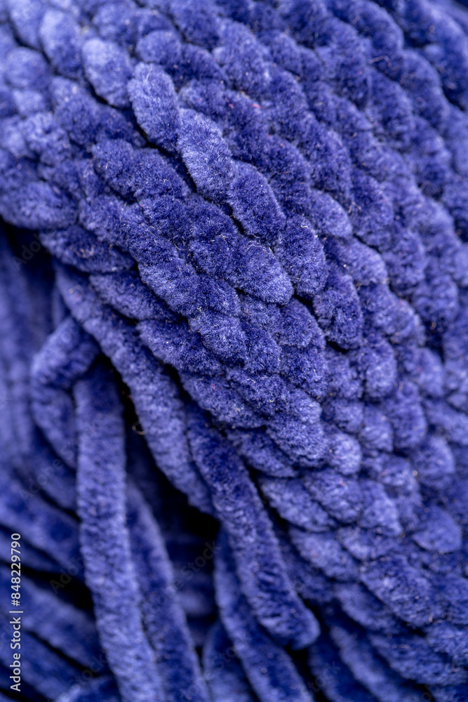 new soft blue threads with traces of other threads in close-up new soft blue threads with traces of other threads in close-up