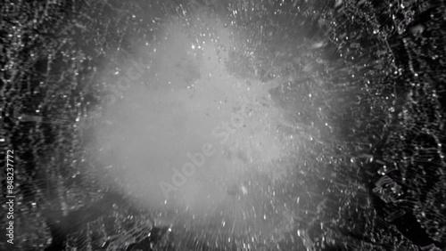 Breaking Glass.
This stock motion graphics video shows glass shattering.