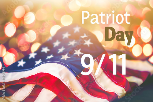 USA flag on light background and words Patriot Day photo