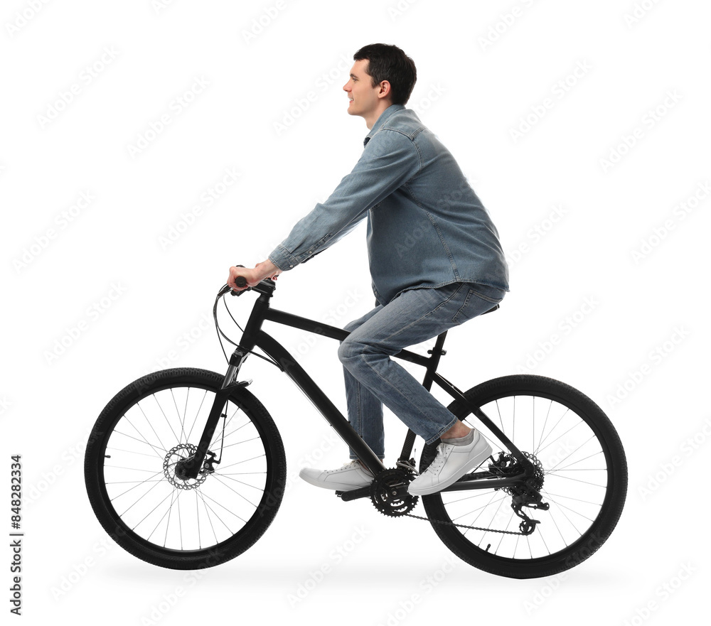 Young man riding bicycle on white background Young man riding bicycle on white background
