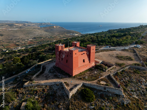 Aerial view of St Agatha's Tower (Red tower). Mellieha city. Landscape on Malta island with the sea