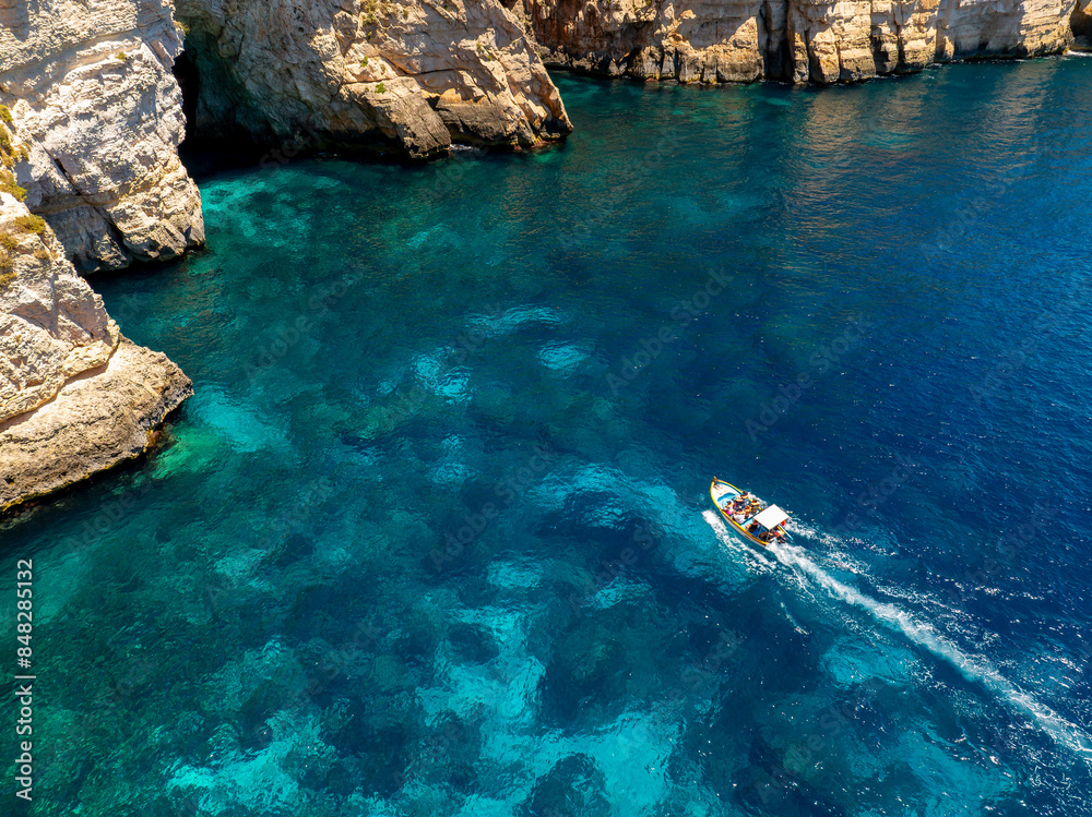 The famous arch and cave in Malta. The name is blue grotto.