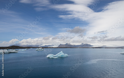 Icebergs Floating in Jokulsarlon Glacial Lagoon on a Sunny Day © Guzel