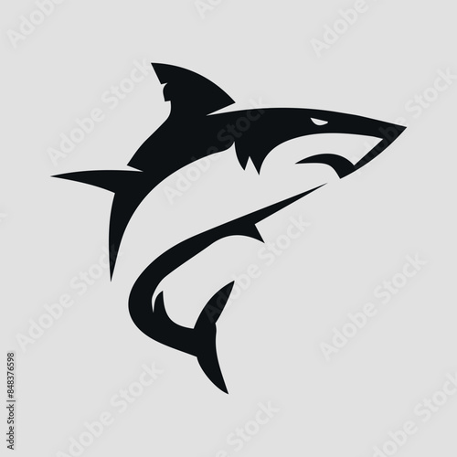 The black silhouette of a shark. Vector icon on a gray background	 photo