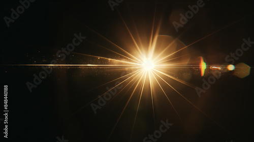 Lense flare overlay on black background design element