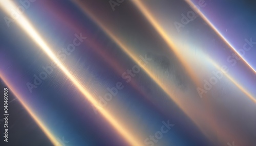 a colorful, reflective surface with gradient hues of blue, purple, and gold, creating a dynamic visual effect.