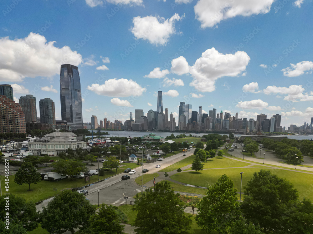 Fototapeta premium NYC aerial view. New York City skyline. Park and cityscape of Manhattan in USA. New York City NYC Manhattan Downtown Skyline, from Jersey City USA.