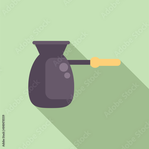 Turkish coffee pot, known as a cezve, with a long handle, traditionally used for making turkish coffee