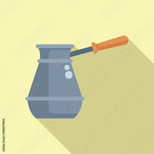 Traditional turkish coffee pot standing on a yellow background with a long shadow