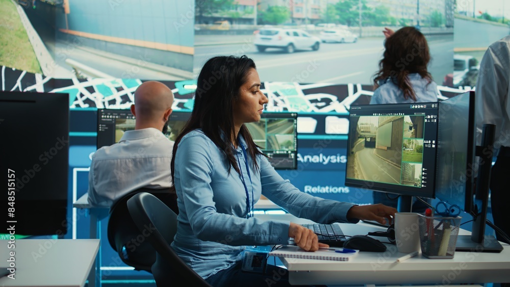 Αυτοκόλλητο Indian employee collecting and transmitting information to couriers, locating the destination and sending the gps coordinates for faster order delivery