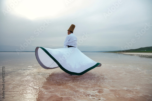 Foto Sunset and whirling at the sea, sufi