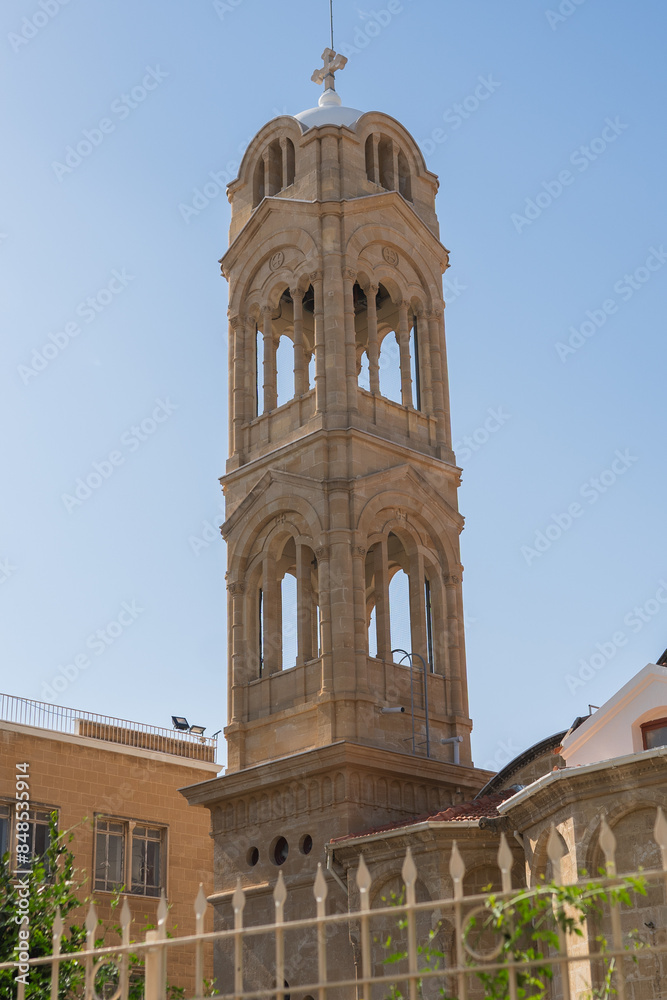 Fototapeta premium Nicosia,Cyprus - November 03, 2023. Bell tower a part of monastery in the southwest of the island. An important Orthodox pilgrimage site.
