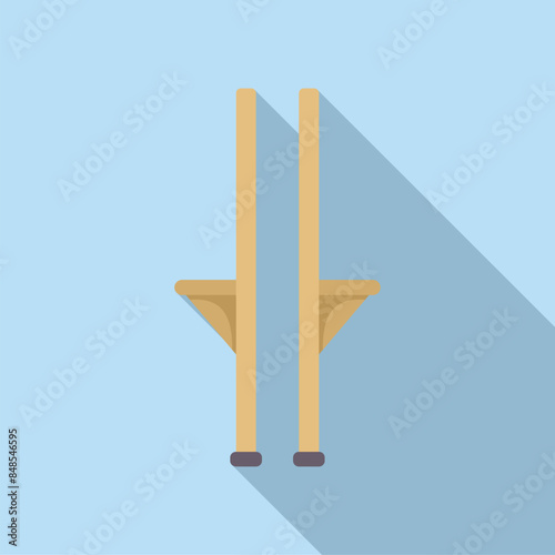Wooden stilts are standing on blue background, waiting for the circus artist to start performing