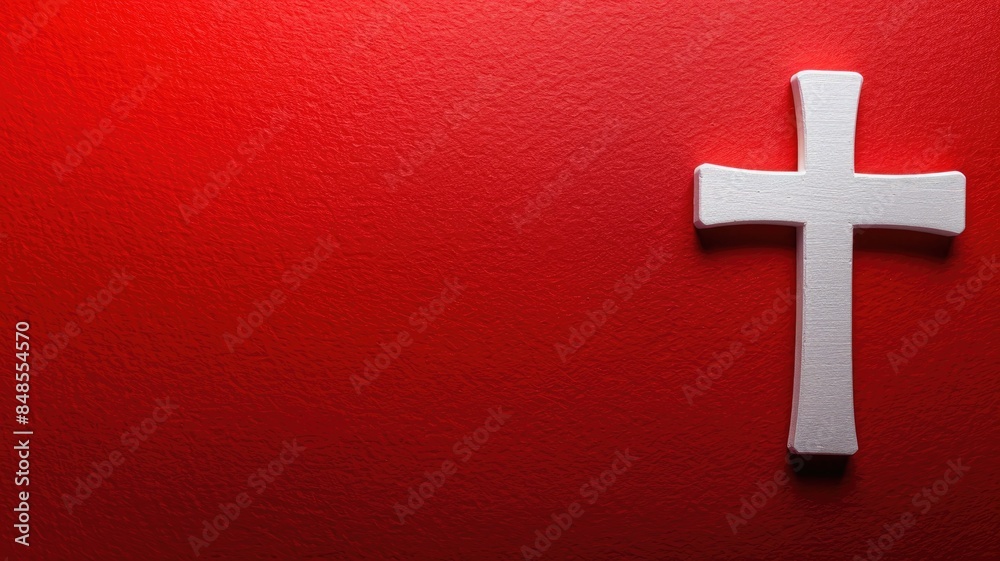 White cross on red textured wall background