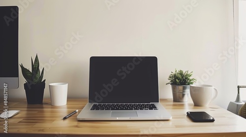 Wallpaper Mural Minimalist laptop setup on wooden table with blank wall background and clean desktop document view Torontodigital.ca