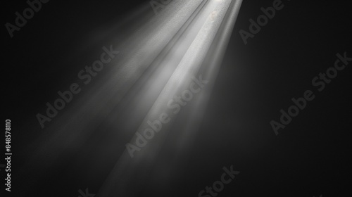 Wallpaper Mural Rays of light shining through a dark background creating a dramatic and ethereal effect Torontodigital.ca